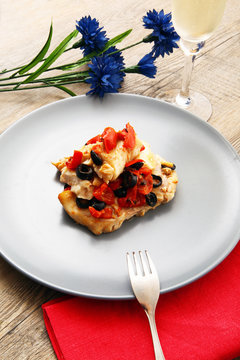 filetti di merluzzo  con pomodori ed olive
