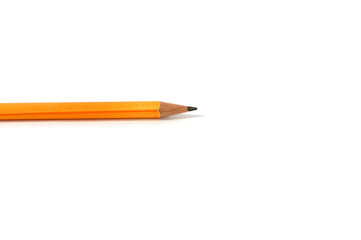 yellow pencil on white background
