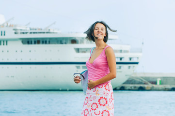 Beautiful young woman accompanies the ship