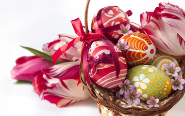 Basket full of Easter eggs and flower