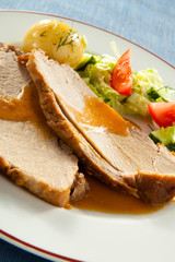 Roasted loin with vegetables