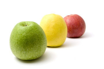 Three apples - red, yellow and green