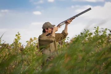 Foto op Plexiglas Hunter hunting the game, bird hunt © NanoStock