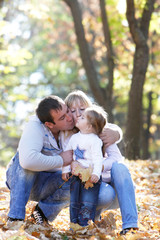 Fototapeta premium happy family in autumn park