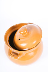 It is a shot of pan with lid on white