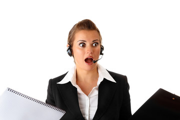 stressed modern business woman with headset  and stationery