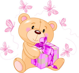 Fototapeta na wymiar Teddy Bear with pink gift
