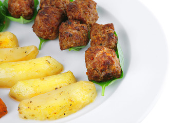 grilled meatballs on white