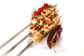 roasted chicken kebab on white