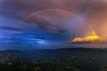 Fototapeta na wymiar Austria Alps with rainbow