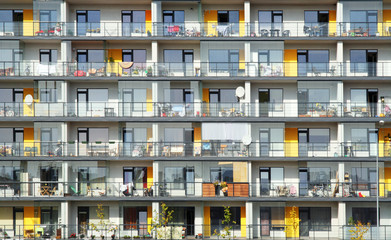 Windows and balconies of a multiroom apartment house