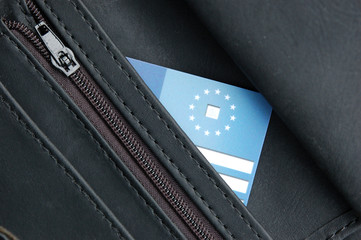 Black wallet with health insurance card