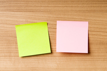 Many reminder notes on the wooden background