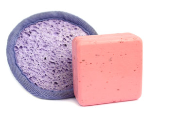 isolated soap and bath sponge