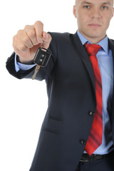 Naklejka premium Businessman gives the keys to the car