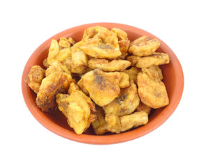 Cooked cinnamon banana in clay bowl