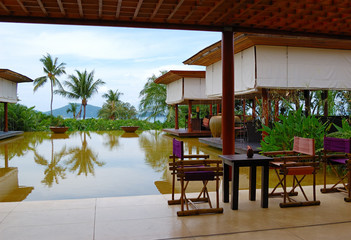 Fototapeta na wymiar Lounge pool view area at luxury hotel, Phuket, Thailand