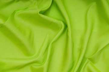 Bright satin fabric folded to be used as background