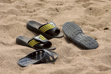 Two pairs beach footwear