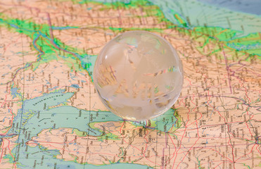 The glass globe on the world map