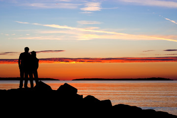 Silhouette of couple in sunset