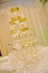 Champagne glasses tower in wedding