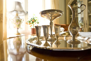 tray on the table and a windowsill on a second plan