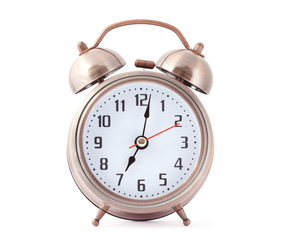 Metal alarm clock with red second hand.