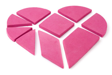 The big pink heart broken into geometrical pieces.