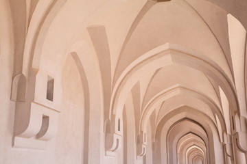 corridor inside Sultan's Palace in Oman. Arcs.