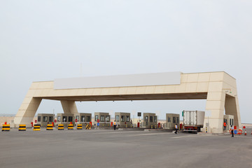 security check-point on road to port and big asphalt area