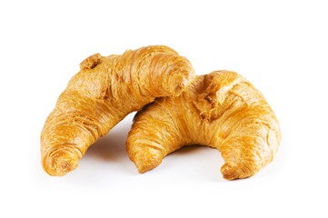 Breakfast concept - croissant and tea isolated on white