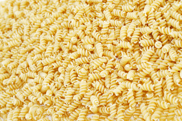 Close-up of italian pasta - spiral shaped, for backgrounds or te