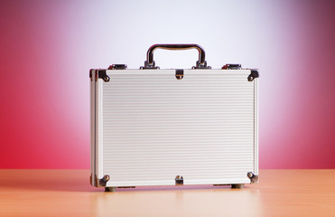 Metal case on the table against background