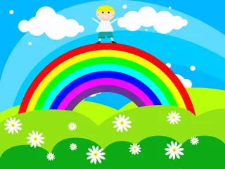 Keuken foto achterwand Regenboog Vrolijke jongen staat op een regenboog