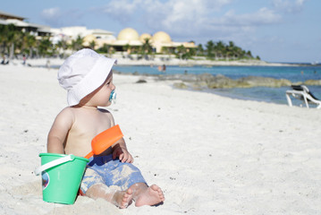 Baby Playing on Tropical Beach