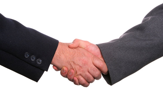Businesspeople shaking hands, finishing up a meeting
