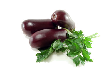 Ripe eggplants and celery greens