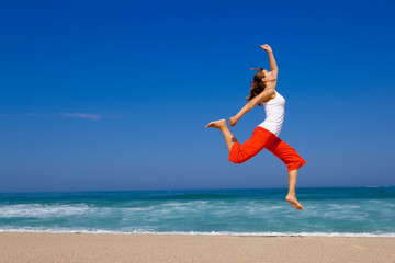 Young woman jumping