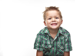 Cute little boy smiling for the viewer