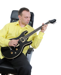 Obraz premium man with a black guitar.