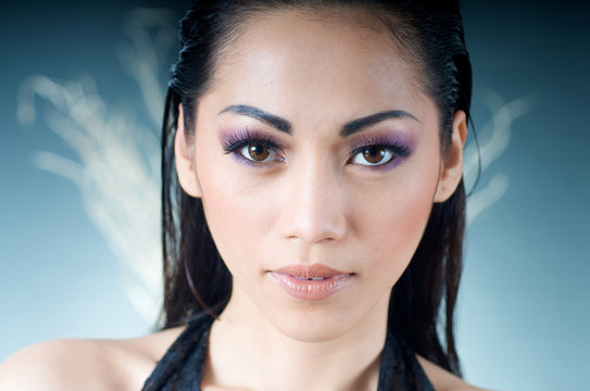 Close up of beautiful Asian woman