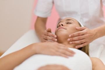 Fototapeta na wymiar Body care - Woman luxury facial massage