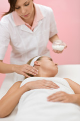 Obraz na płótnie Canvas Body care - woman cosmetics treatment