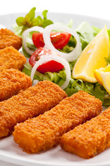 Fried fish fingers and vegetables