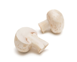 handful of raw mushrooms isolated on white background