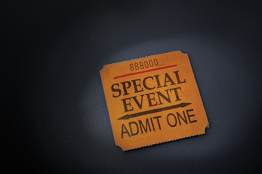 event ticket stub in spotlight