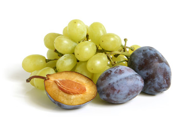 Bunch of grapes and plums