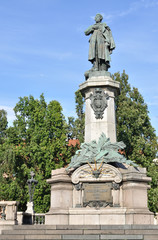 Fototapeta na wymiar Statue of Adam Mickiewicz in Warsaw. Poland