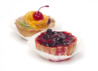 fruit cupcake with cherry  isolated on white